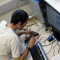 Photo of student working in lab.