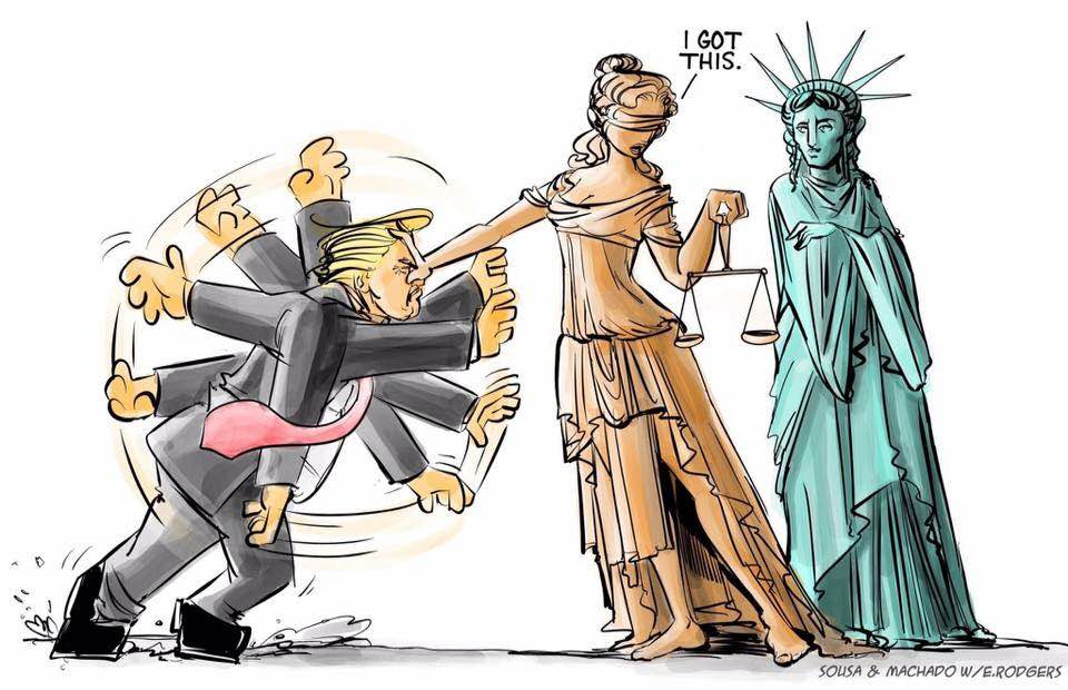 Lady Liberty reassuring Lady Justice that she can handle the assault on freedoms