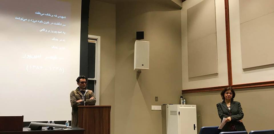 Photo of Dr. Pedram Khosronejad lecturing and Dr. Nayereh Tohidi standing to the side