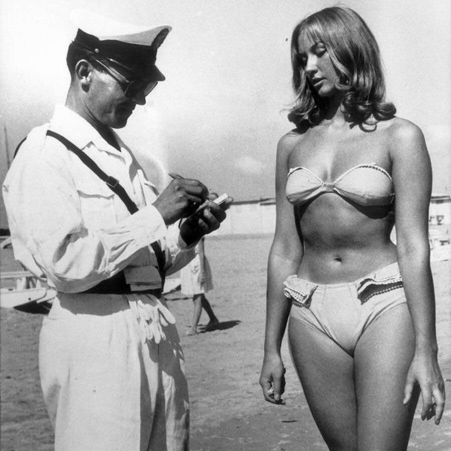 Woman receiving a ticket for wearing a bikini in Italy