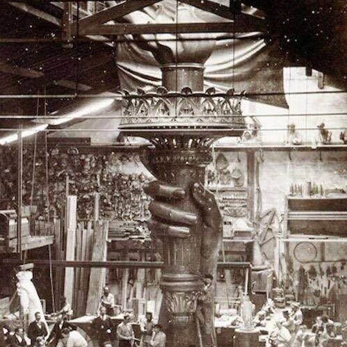Lady Liberty's hand and torch being built in a Paris studio, 1876