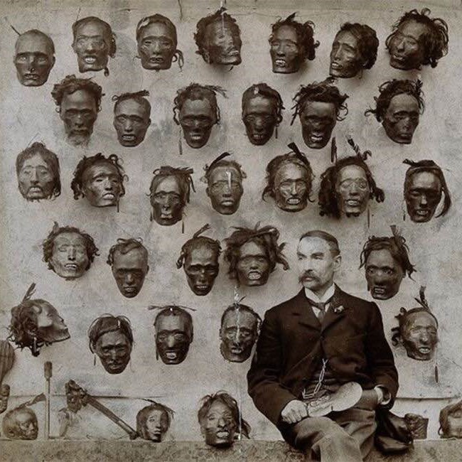 Major General Horatio Gordon Robley, with his collection of Maori heads, 1895