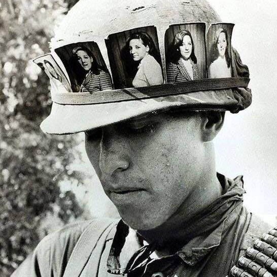 US soldier (Vietnam, 1968) keeps photos of his girlfriend with him at all times