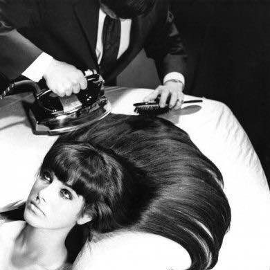 Hair ironing ritual in the 1960s