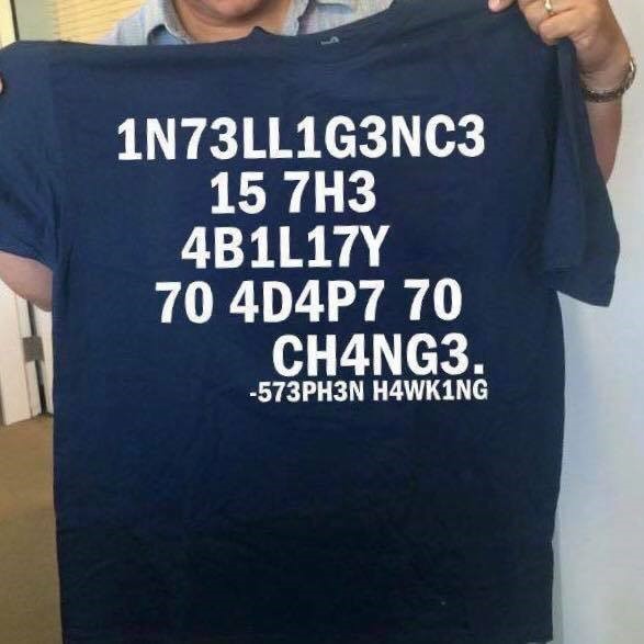 T-shirt with the message 'Intelligence is the Ability to Adapt to Change'