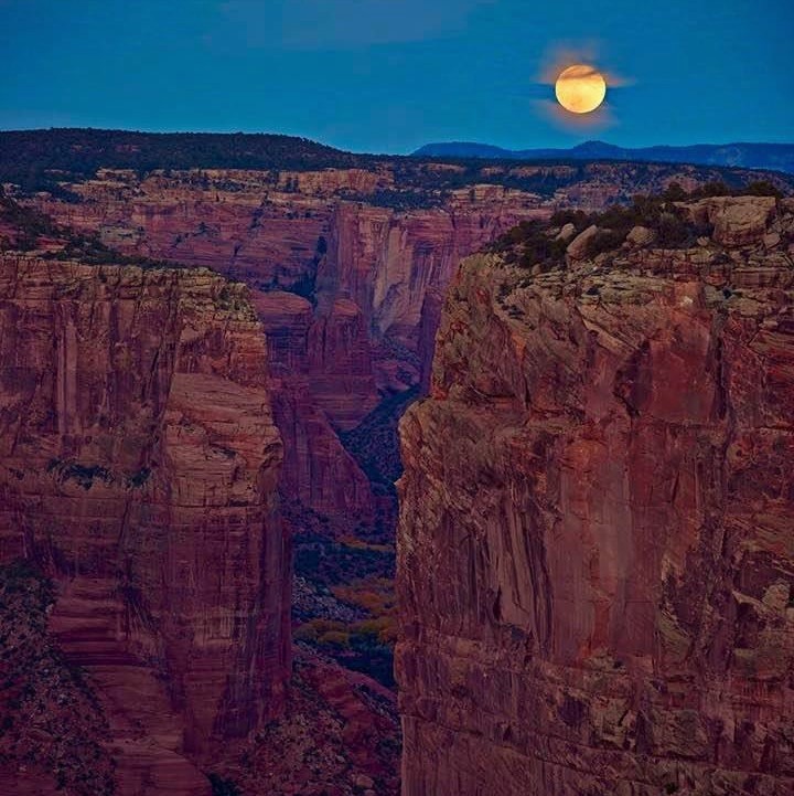 Moon over canyon