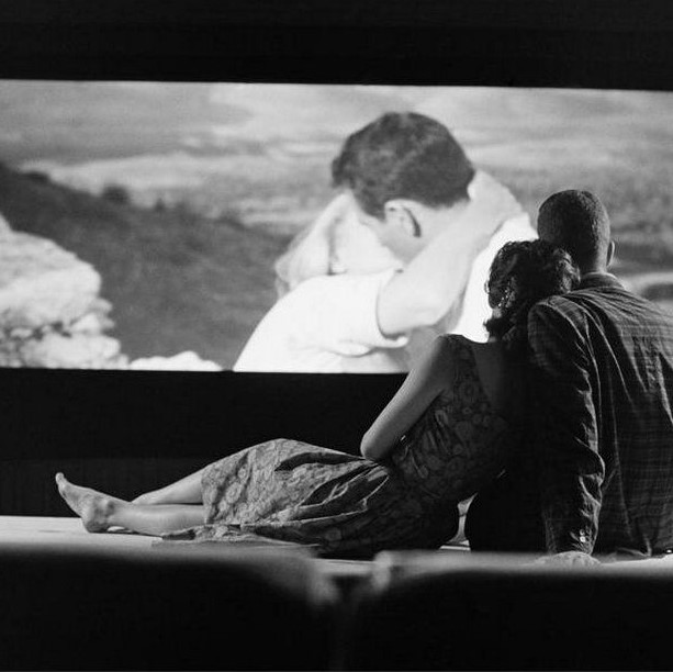 Young couple at a drive-in theater, 1961