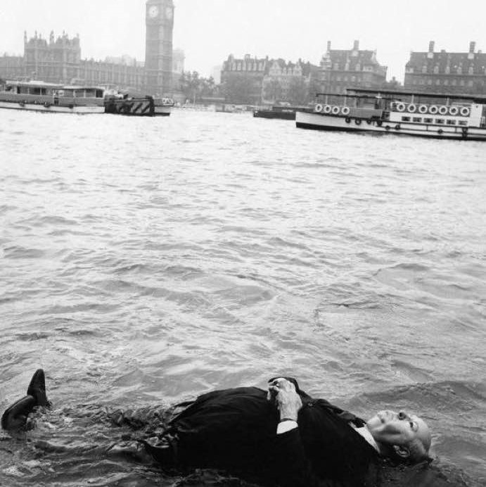 Alfred Hitchcock seeking inspiration in the river Thames, 1960s
