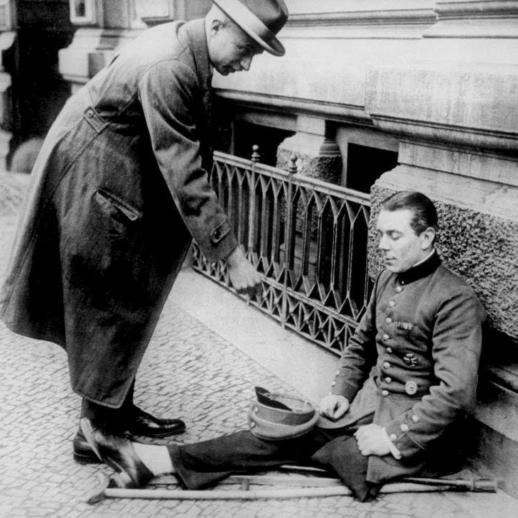 A disabled war veteran begging in Berlin, 1923