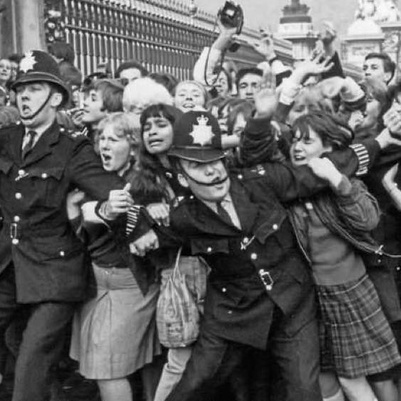 Thousands await the arrival of The Beatles, 1960s