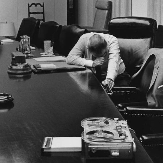 US President Lyndon Johnson listens to a tape sent to him by Captain Charles Robb (his son in law), from Vietnam during the height of the war, 1968