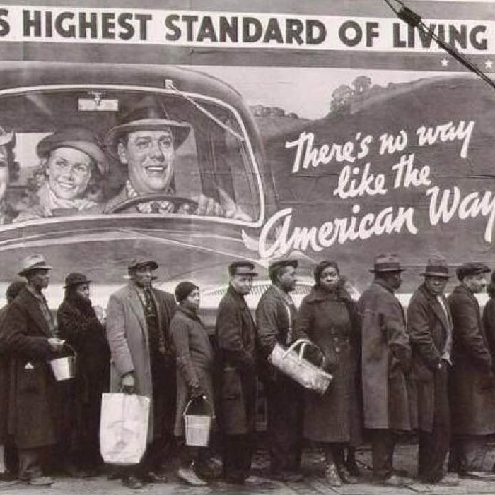 Irony, as people wait in a breadline in Ohio, during The Great Depression, 1937 (photo by Margaret Bourke-White)