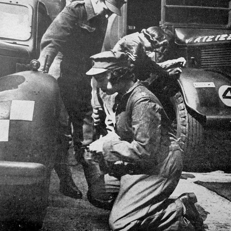 Princess (later Queen) Elizabeth of Great Britain doing technical repair work during her WW II military service, 1944