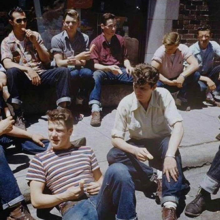Teens hanging out, unknown location, 1950s