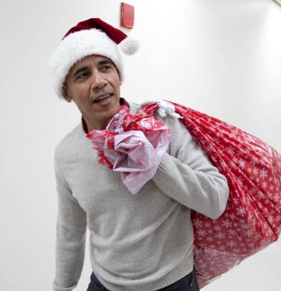 Former President Barack Obama plays Santa to kids in a children's hospital