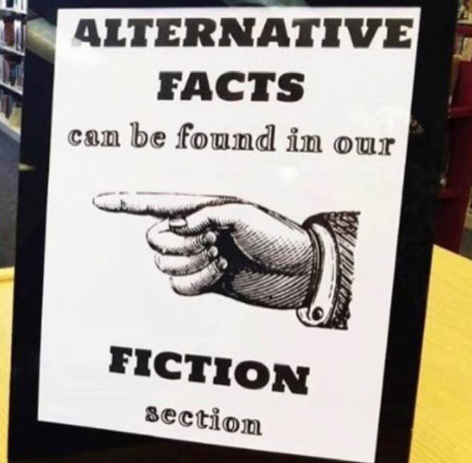 A clever bookstore sign reads: Alternative facts can be found in our fiction section