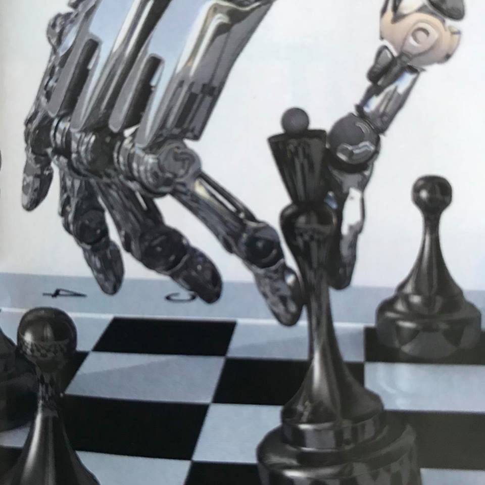 Image of robotic hand, playing chess