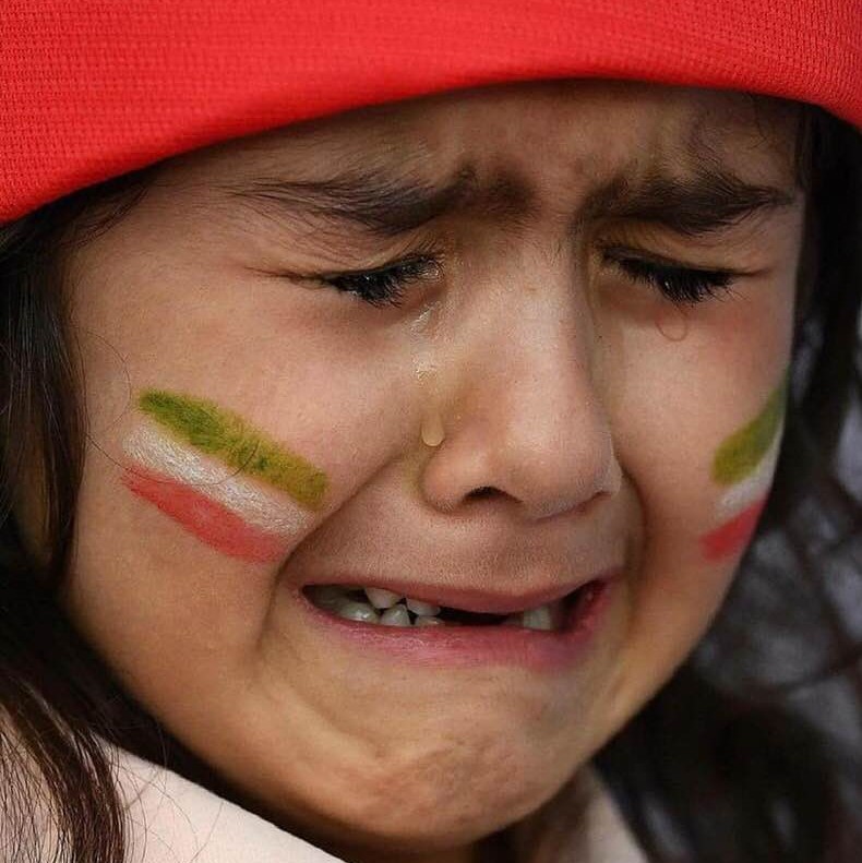 This adorable little girl is disappointed at Iran losing to Japan 0-3 in soccer's Asian Cup semifinals