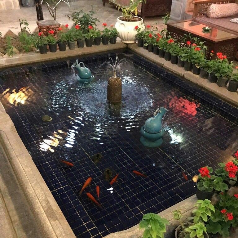 Persian-style courtyard and fish pond