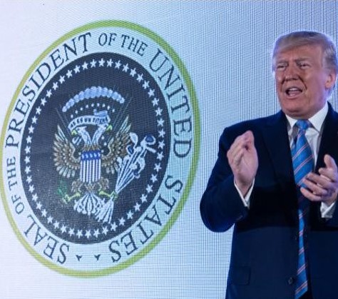 Trump spoke in front of a prankster's fake Presidential Seal