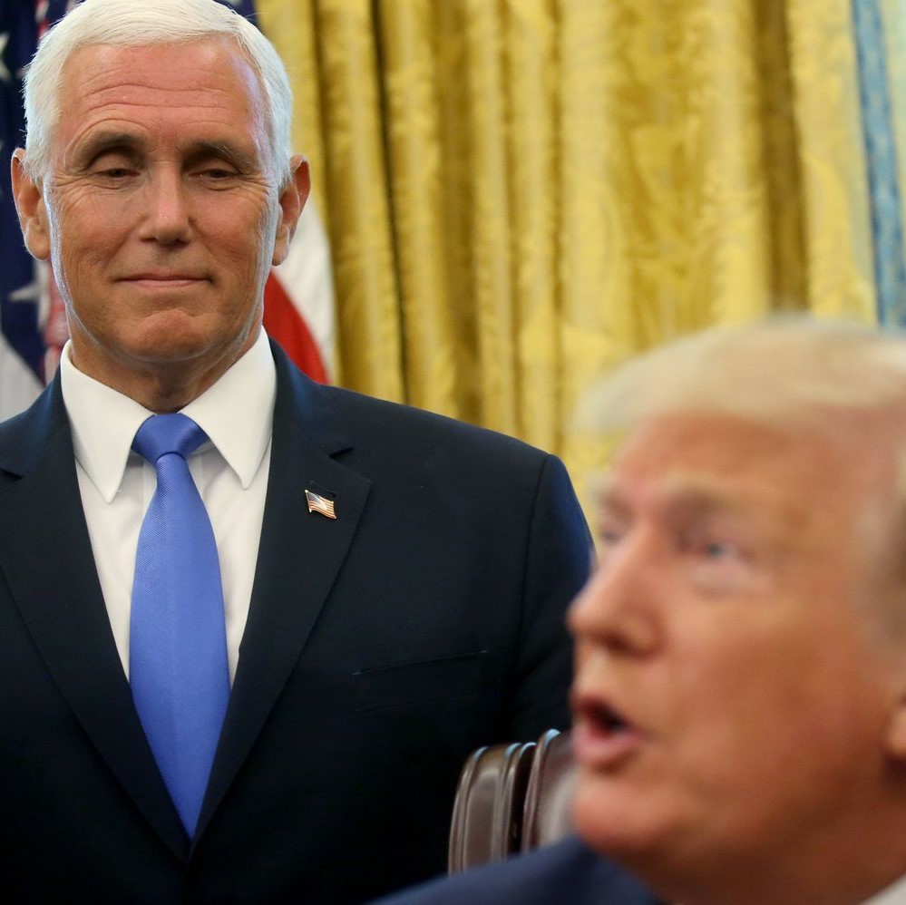 Vice-President Mike Pence looks at President Donald Trump adoringly