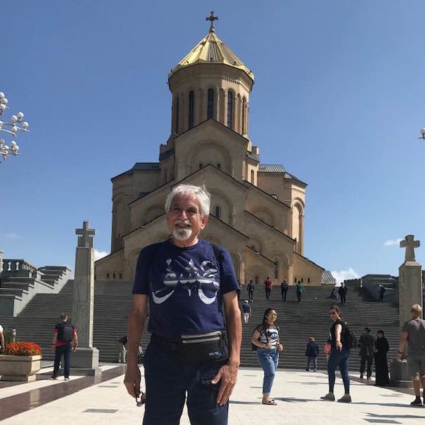 Photo of me in front of the Holy Trinity Cathedral of Tbilisi