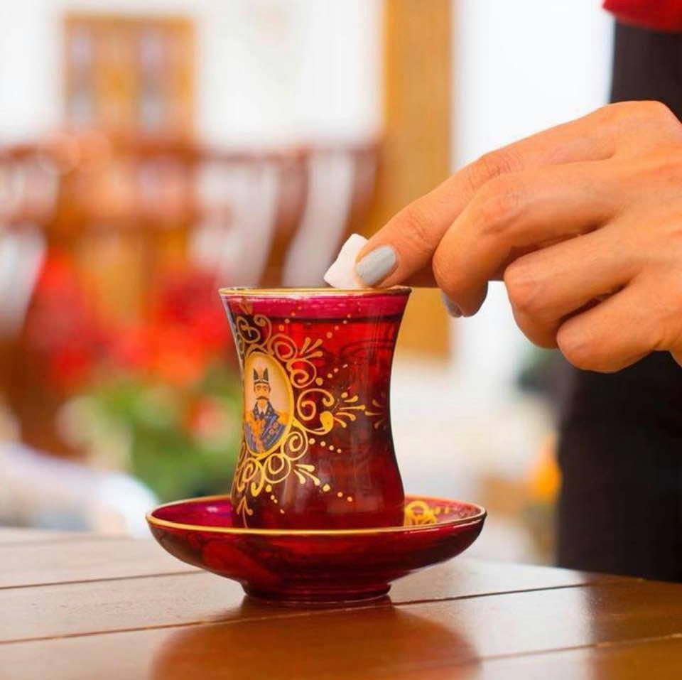 Tea served Iranian style: With sugar cube