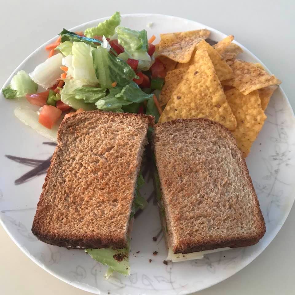My typical lunch, at home or on the go: Sandwich, salad, and Doritos
