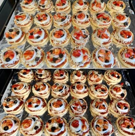 A large batch of mini-pizzas, made with English muffins and veggie toppings