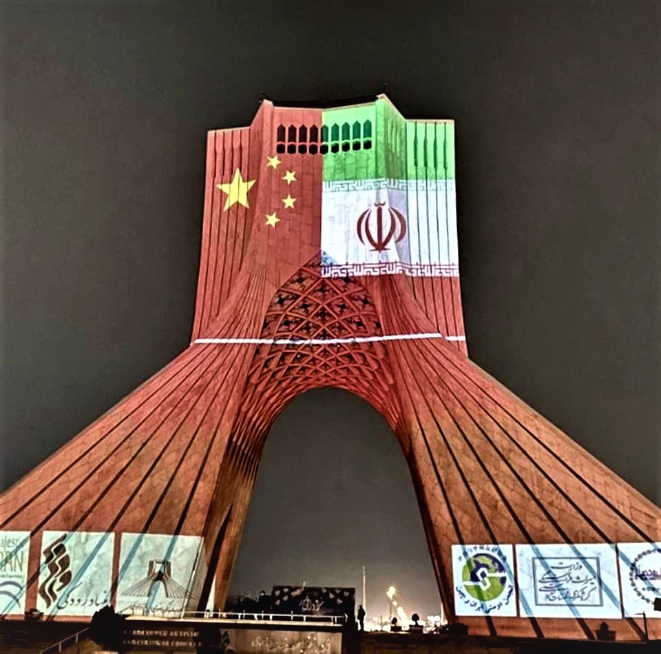 Tehran's Azadi Tower, with projected Chinese and Iranian flags