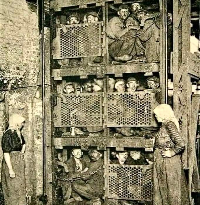 Happy US Labor Day! This image shows mine workers put in cages during their off-hours