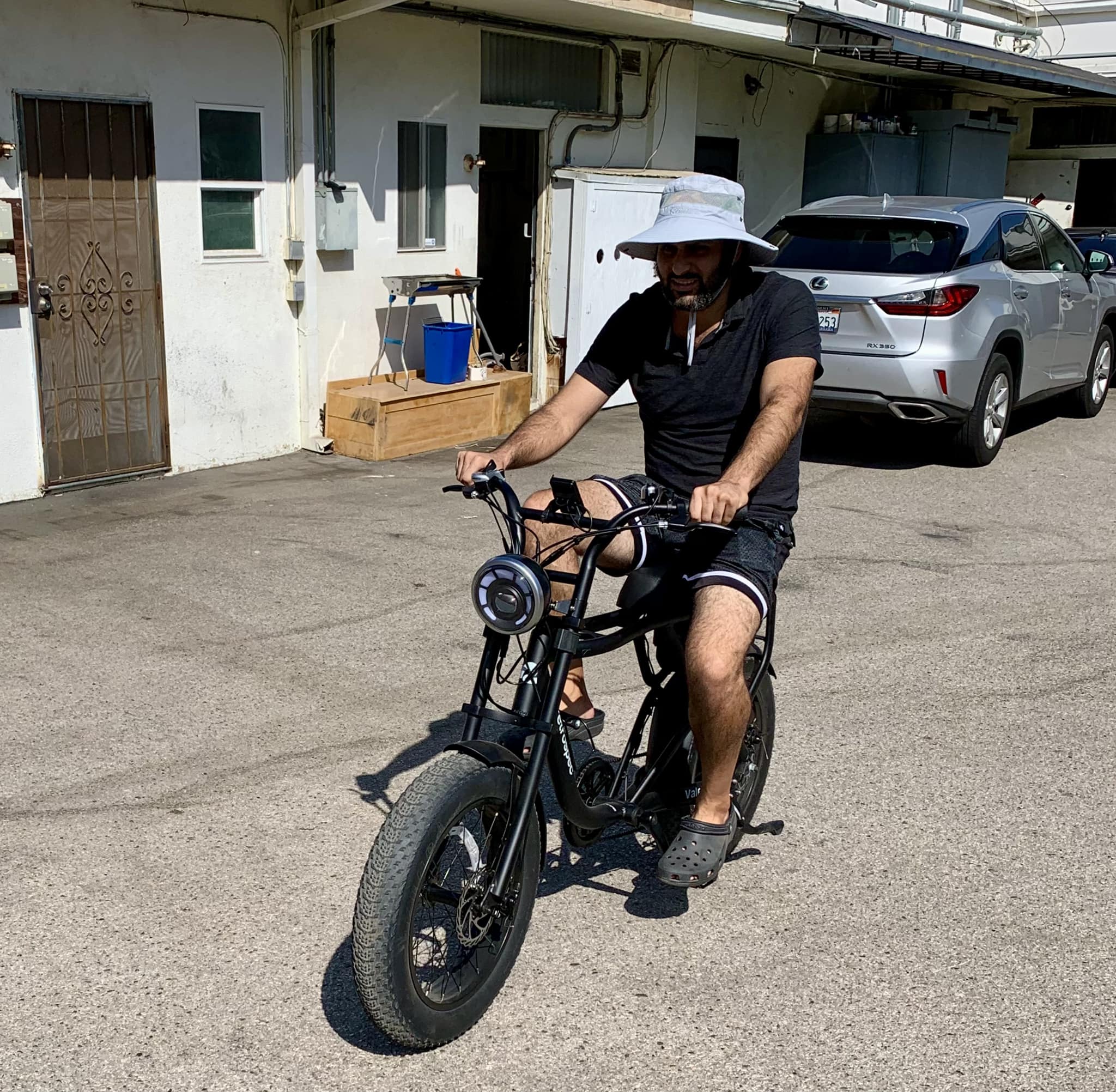 My son tries his new e-bike behind the store in Isla Vista where he bought it