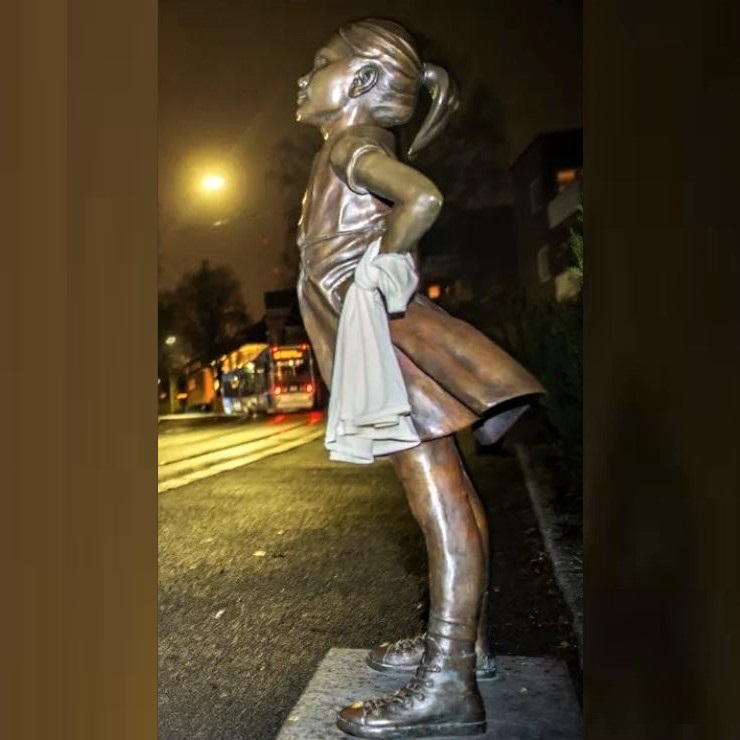 The Fearless Girl: The owner of this statue has placed it in front of Islamic Republic of Iran's Embassy to express solidarity with the people of Iran