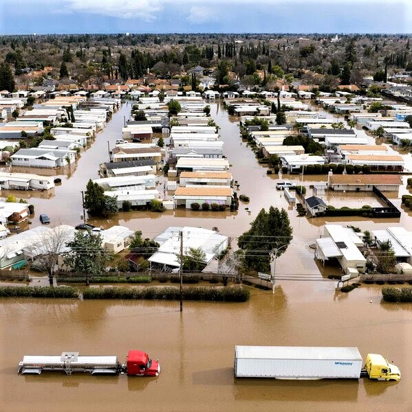 Flooded neighborhood in Merced, California: Seventeen have died so far