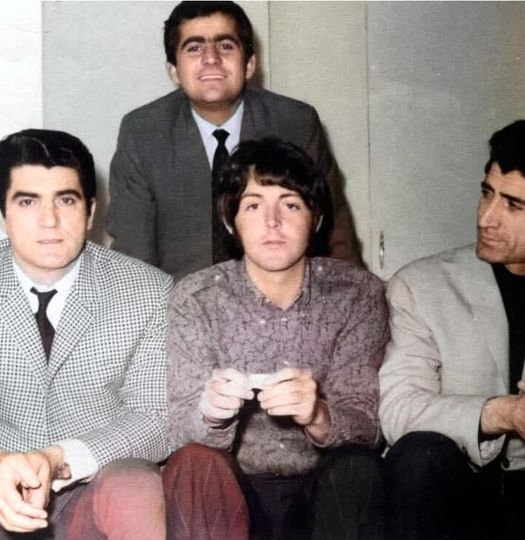 Paul McCartney, flanked by Iranian pop singer Viguen and his brother, Tehran, March 1968