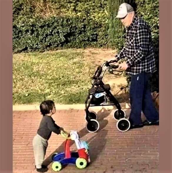 Circle of life: Baby and old man with walkers