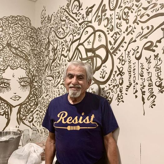 Yours truly, in front of wall art at Sadaf Restaurant in Encino