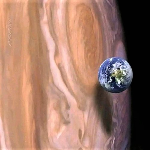 In this image, Earth is compared in size to the much larger Jupiter, which has a diameter of ~11 times that of Earth, giving it a volume of ~1300x