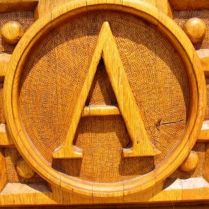 Capital letter A carved in wood