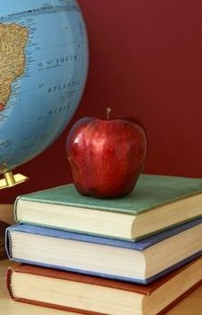 Globe, apple, and textbooks